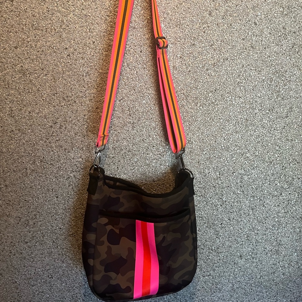 Neoprene cross-body.